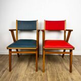 Pair of Scandinavian bridge armchairs in wood and vinyl from the 1950s.