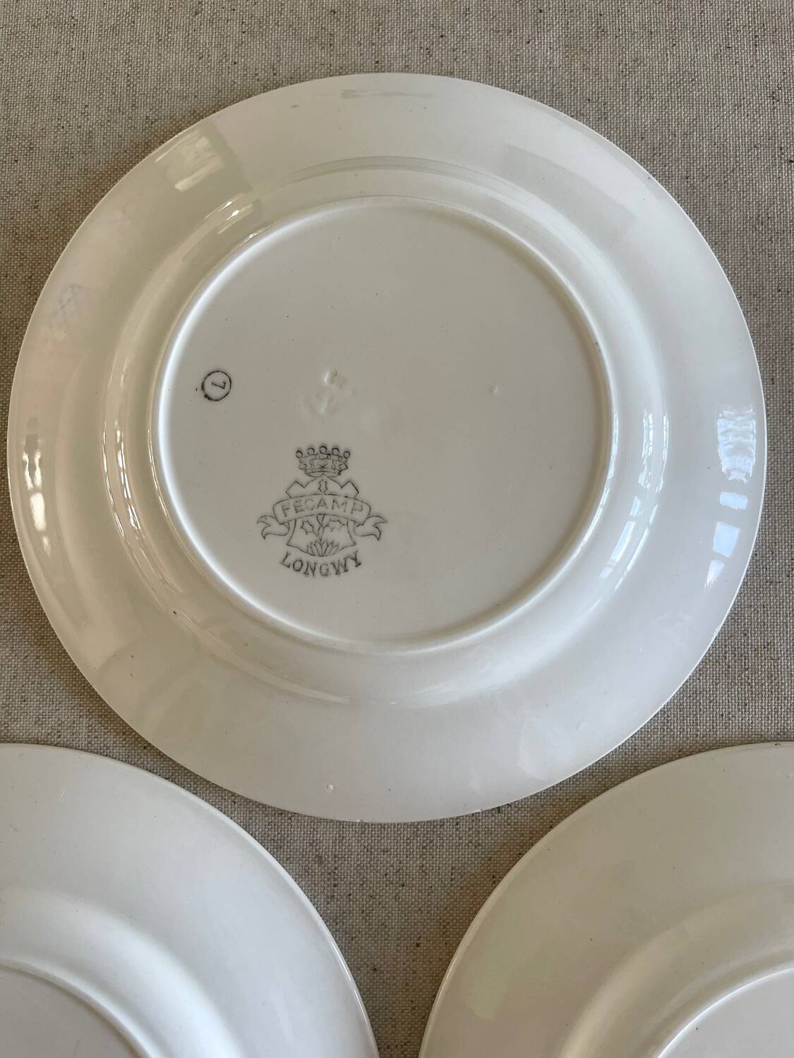 3 Longwy dessert plates.
