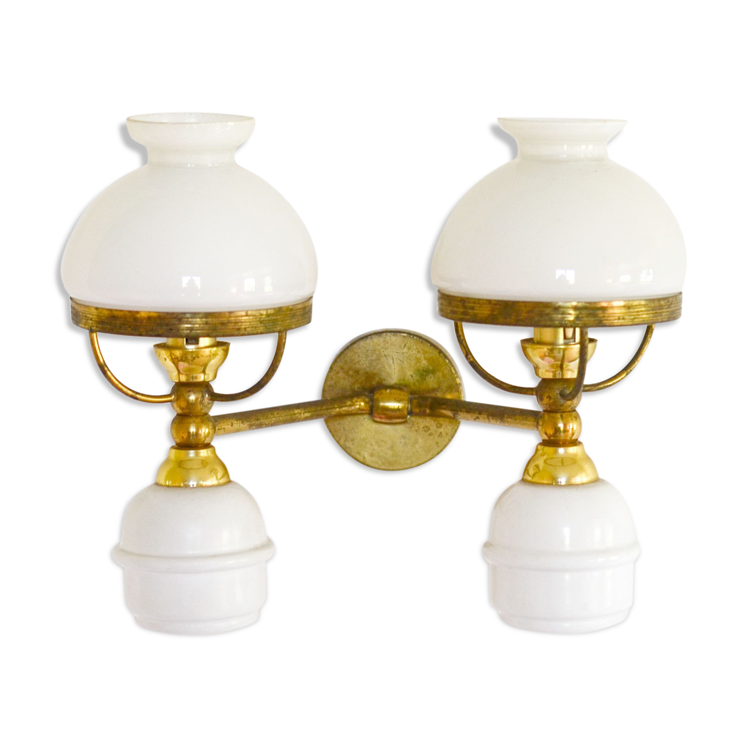 A double brass and opaline wall light