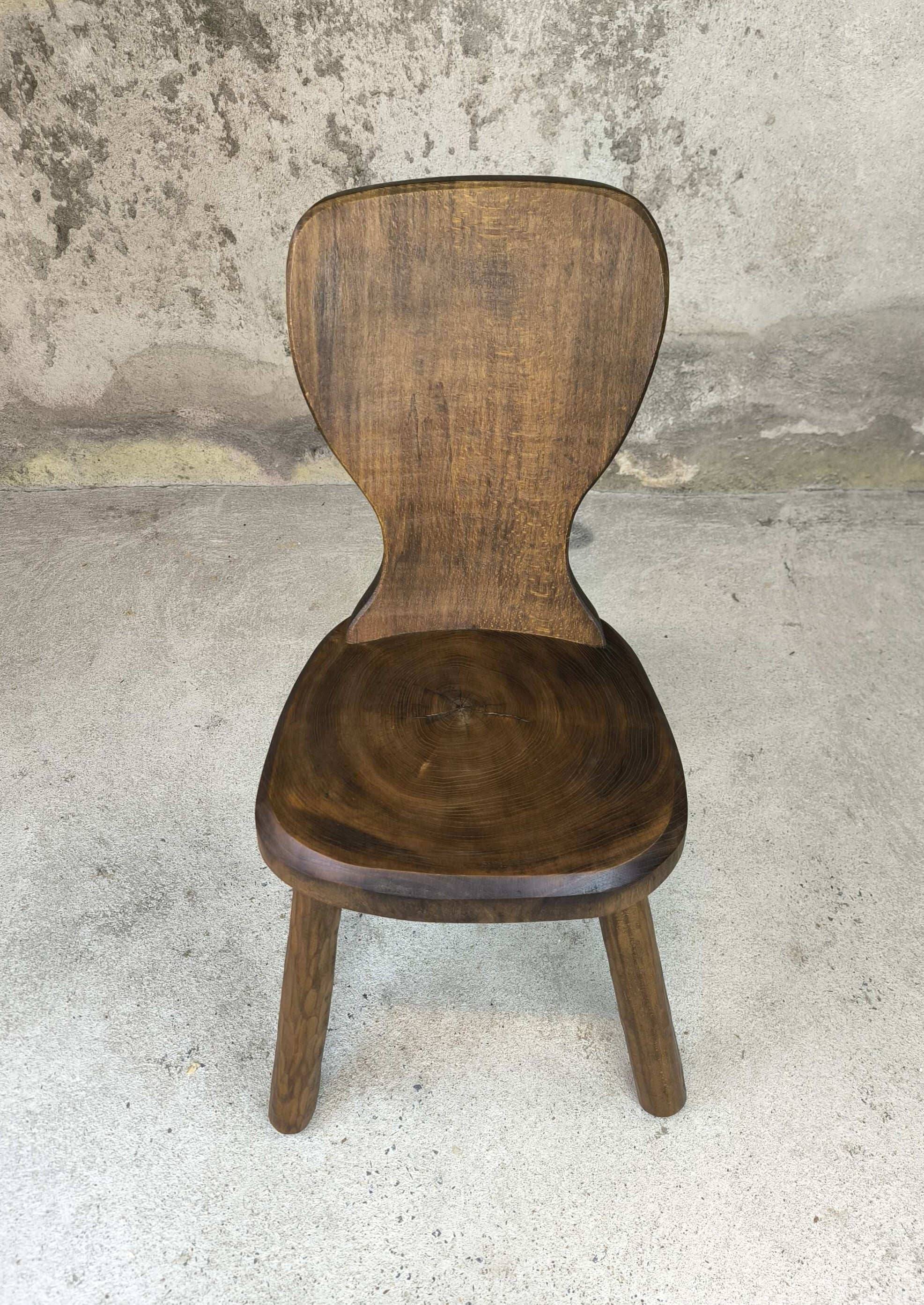 Vintage tripod chair made of solid wood.