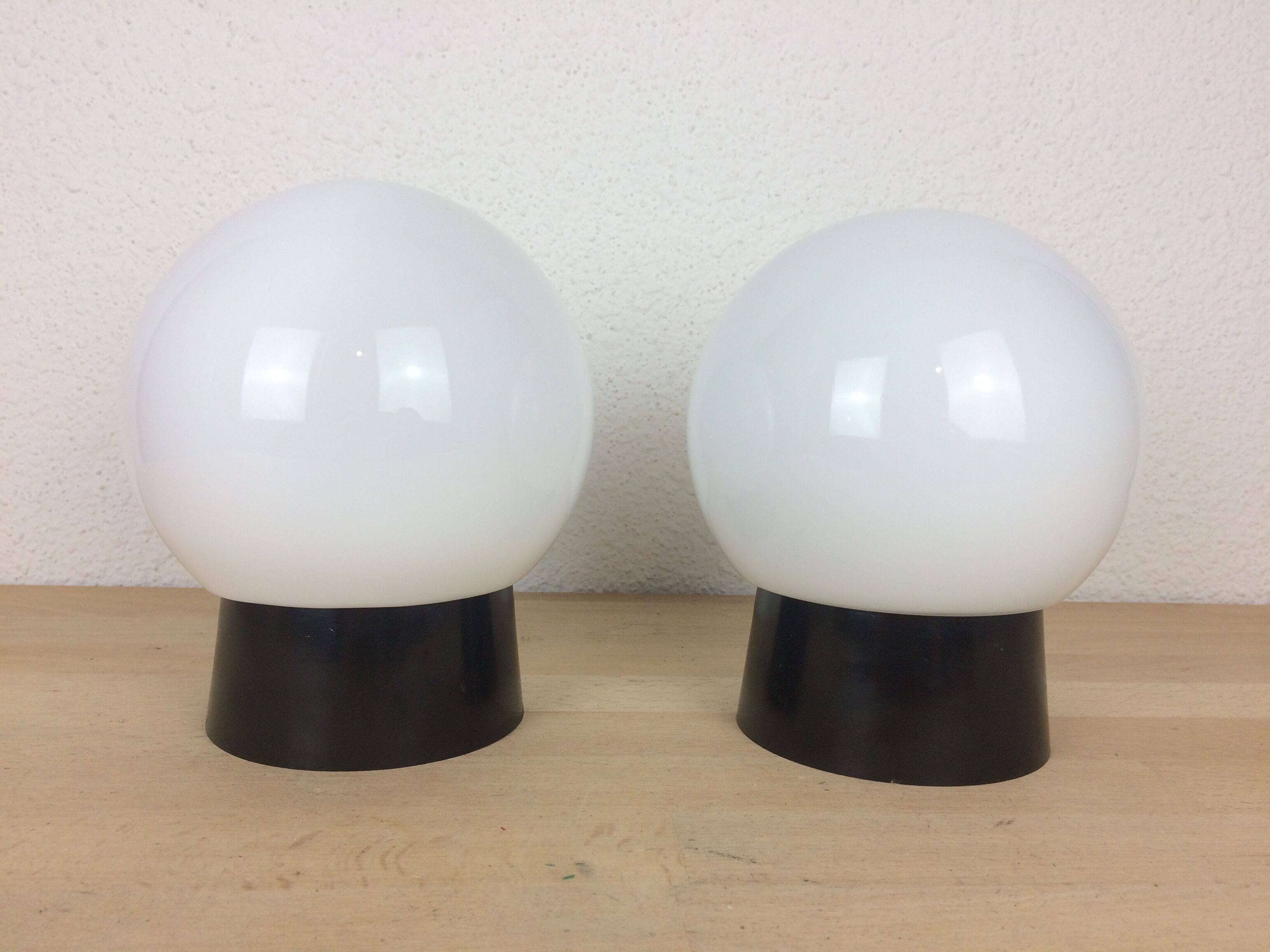 Pair of opaline globe and bakelite wall lamps RZB Leuchten