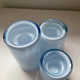 Trio of vintage candlesticks in double-layer glass paste