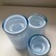 Trio of vintage candlesticks in double-layer glass paste