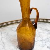 Carafe ancienne en verre soufflé ambré
