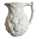 Jug in slipware with fruits