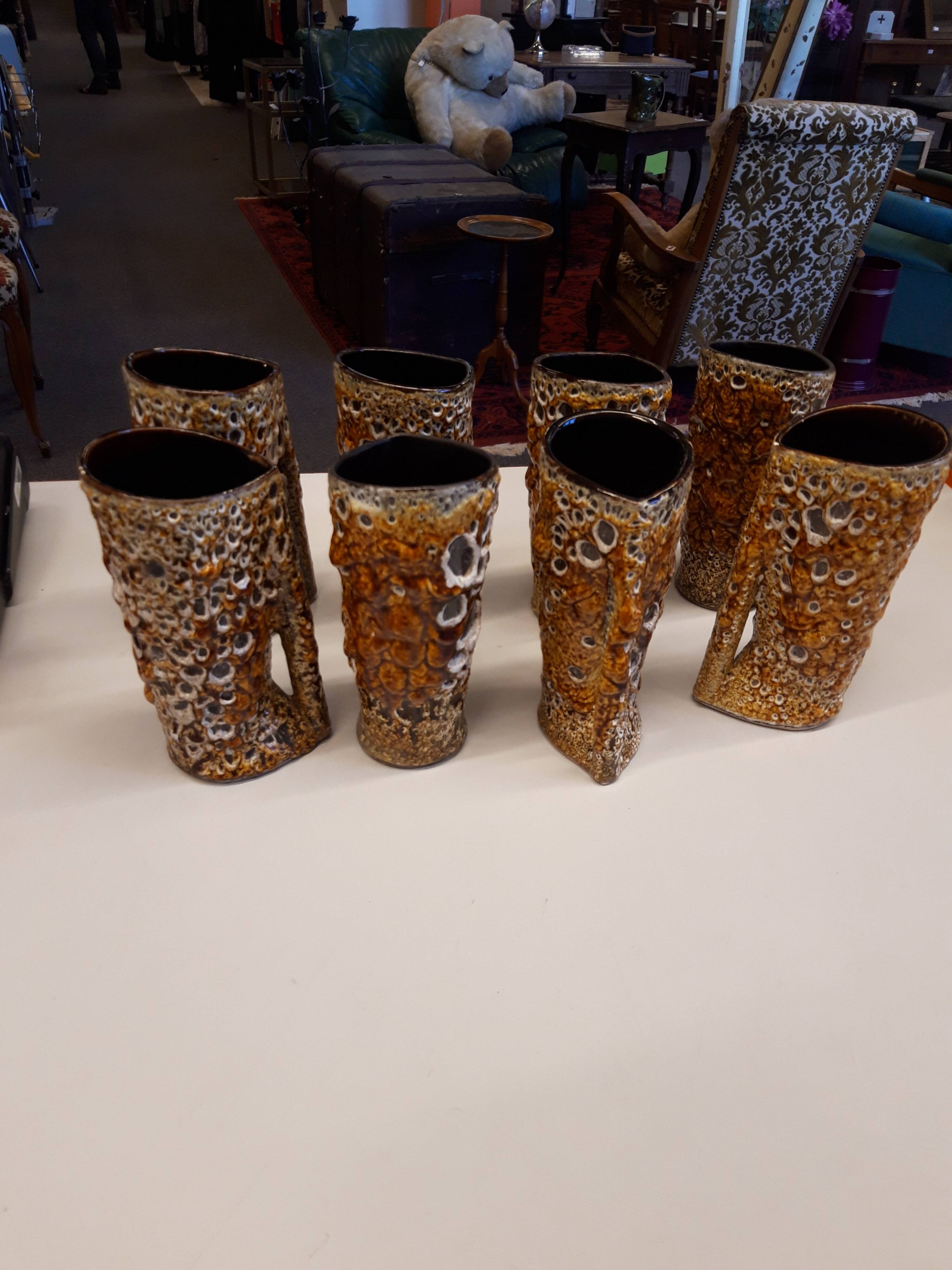 Set of 8 glazed ceramic mugs