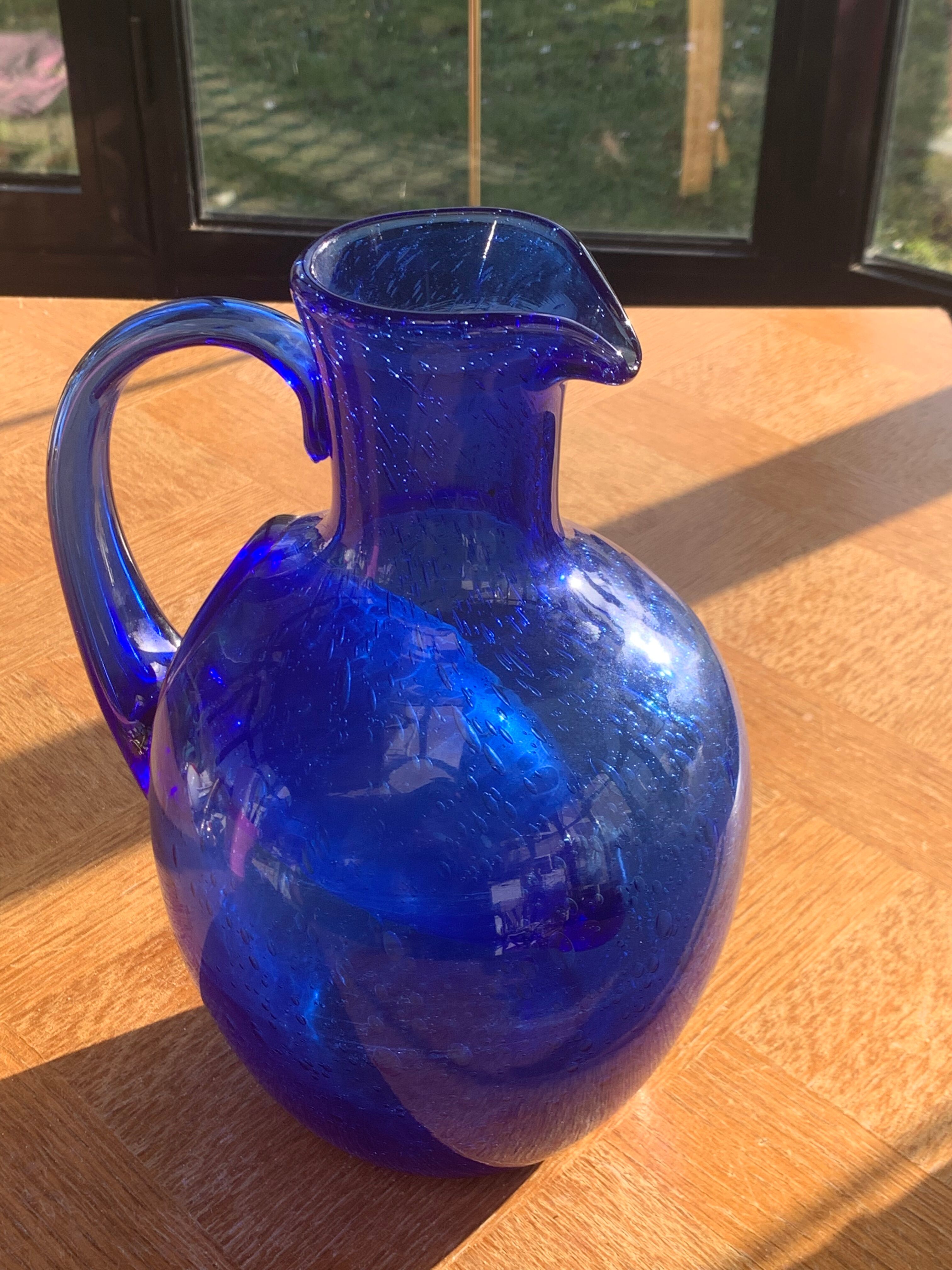 Blue blown glass ice decanter from vintage biot glassware