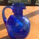 Blue blown glass ice decanter from vintage biot glassware
