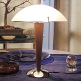 Table lamp legs chrome wood lampshade opaque glass.