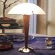 Table lamp legs chrome wood lampshade opaque glass.