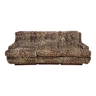 Vintage sofa in leopard fabric