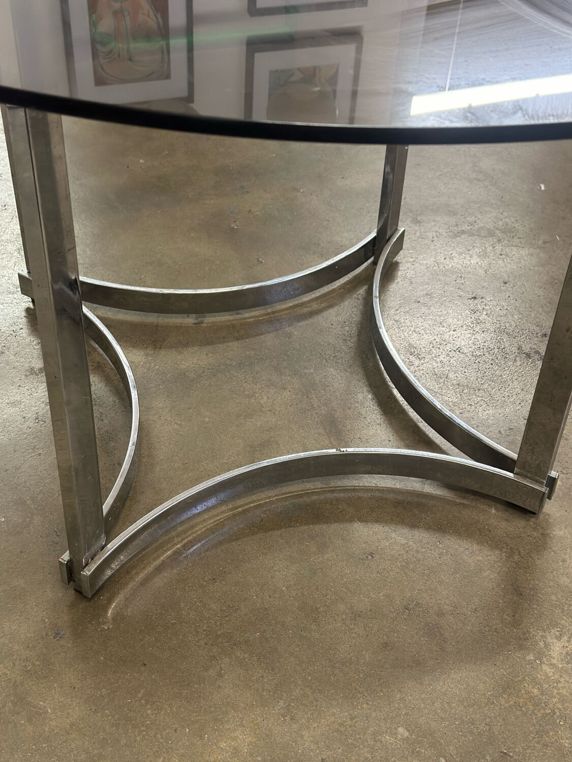 Dining table in chrome metal and smoked glass.