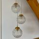 Suspension cascade three lights vintage globes in molded glass