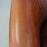 Cognac-colored sheepskin leather club chair