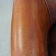Cognac-colored sheepskin leather club chair