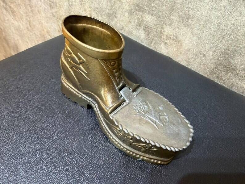 Vintage ashtray in the shape of a hiking boot with a hinged lid