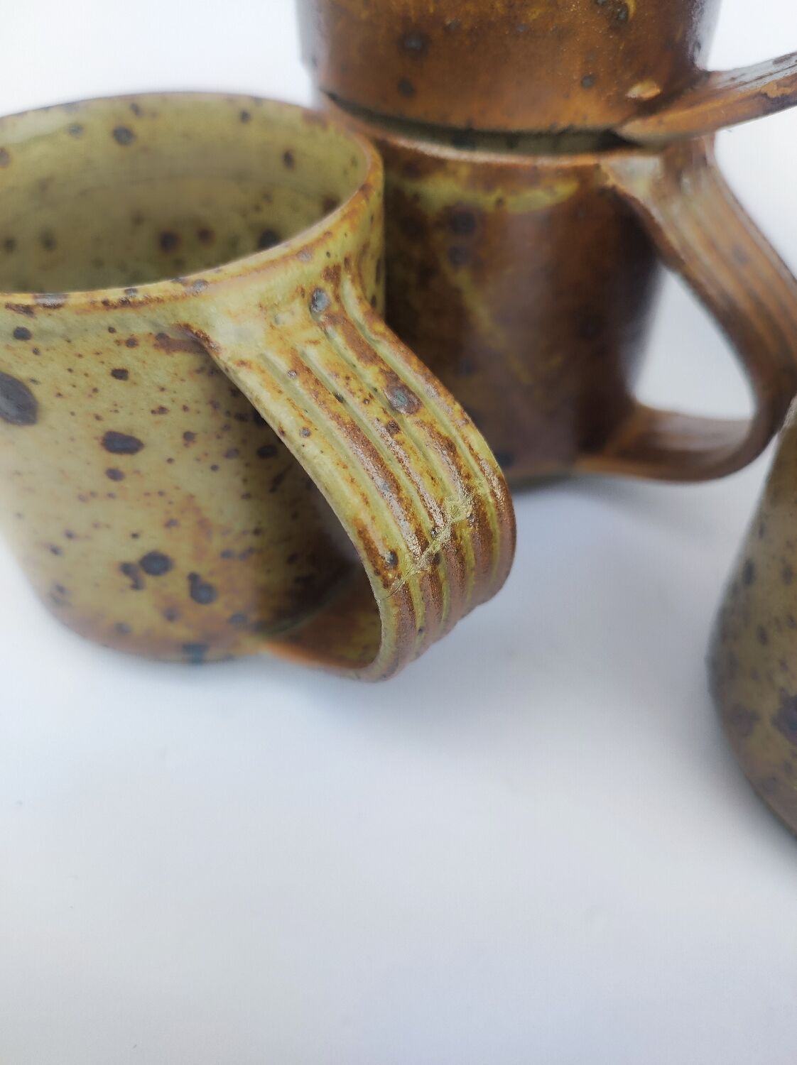 Cups + sandstone saucer by Puisaye Gaudry