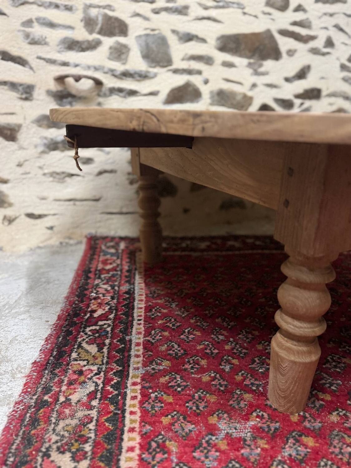 Oval coffee table in raw wood