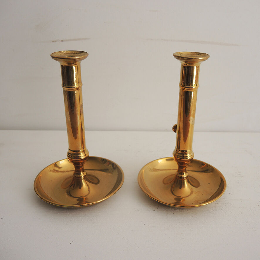 2 antique brass push candle holders