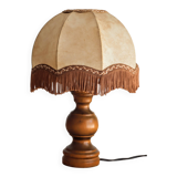 Table lamp in turned wood and umbrella-style leather lampshade