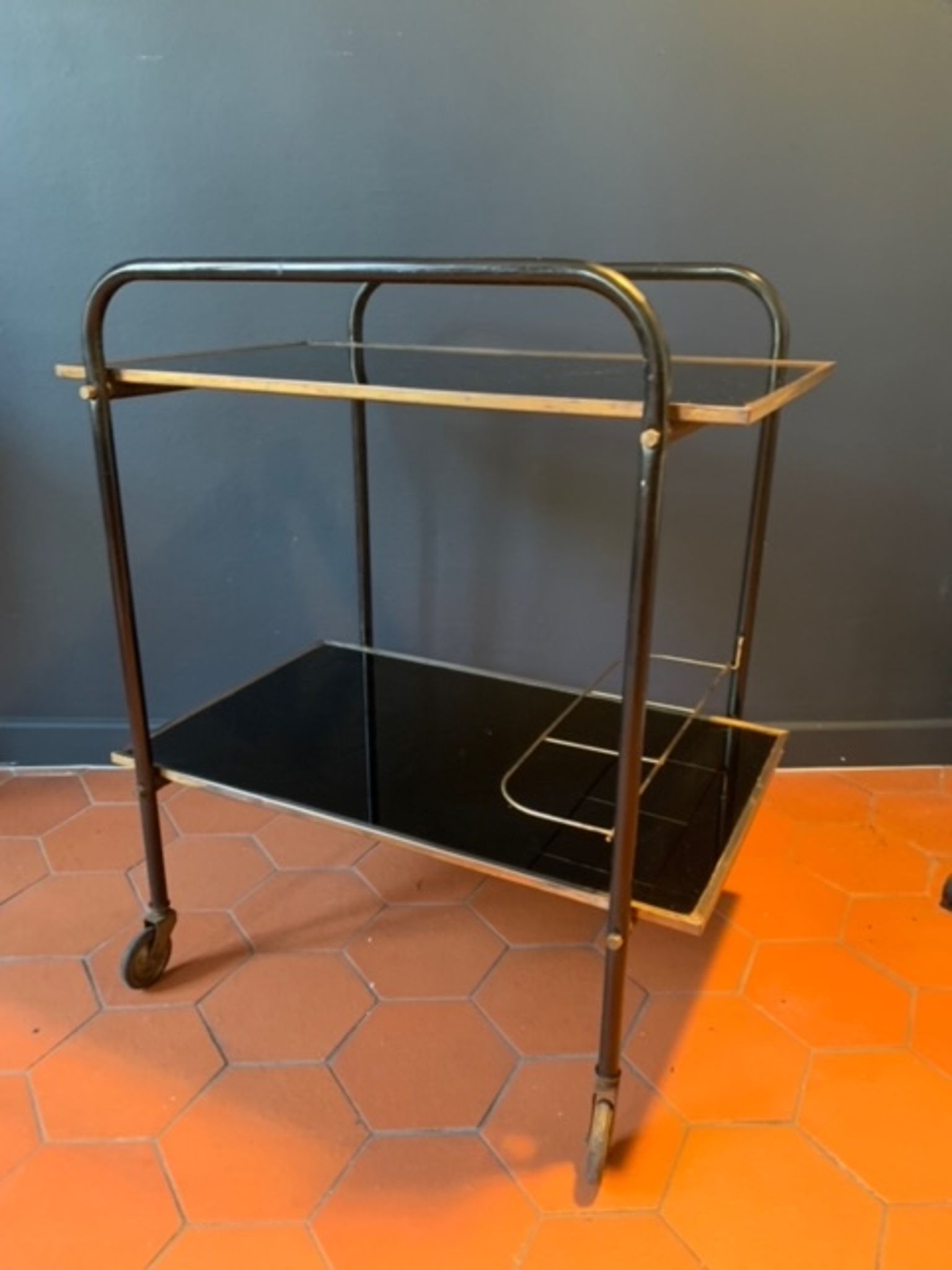 Bar service with wheels in black glass and gilded brass 50s