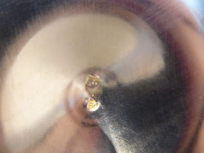 Pair of silver metal candle holders