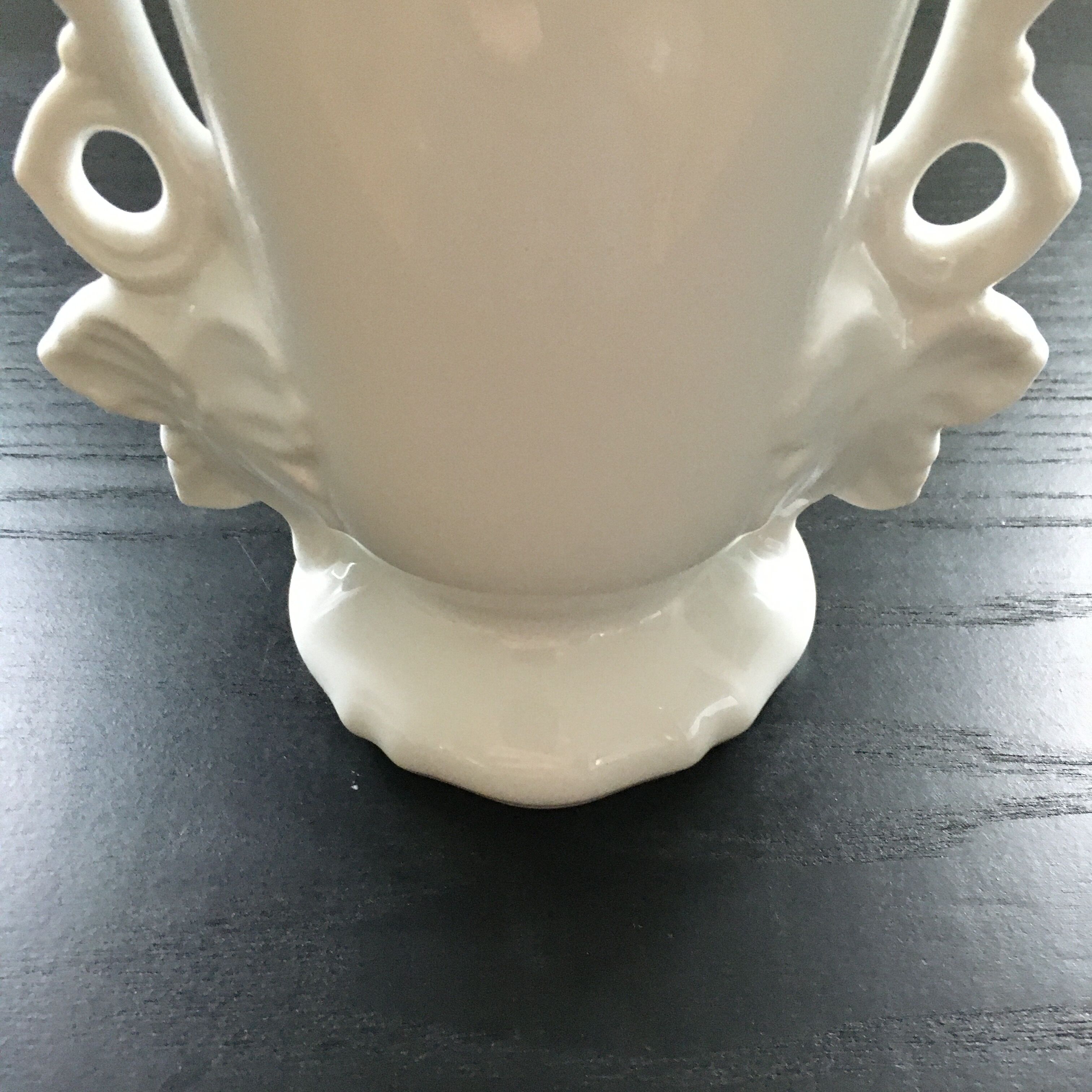White vase flowery handles