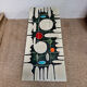 Vintage coffee table from the 60s and 70s in ceramic, chrome metal, and wood.