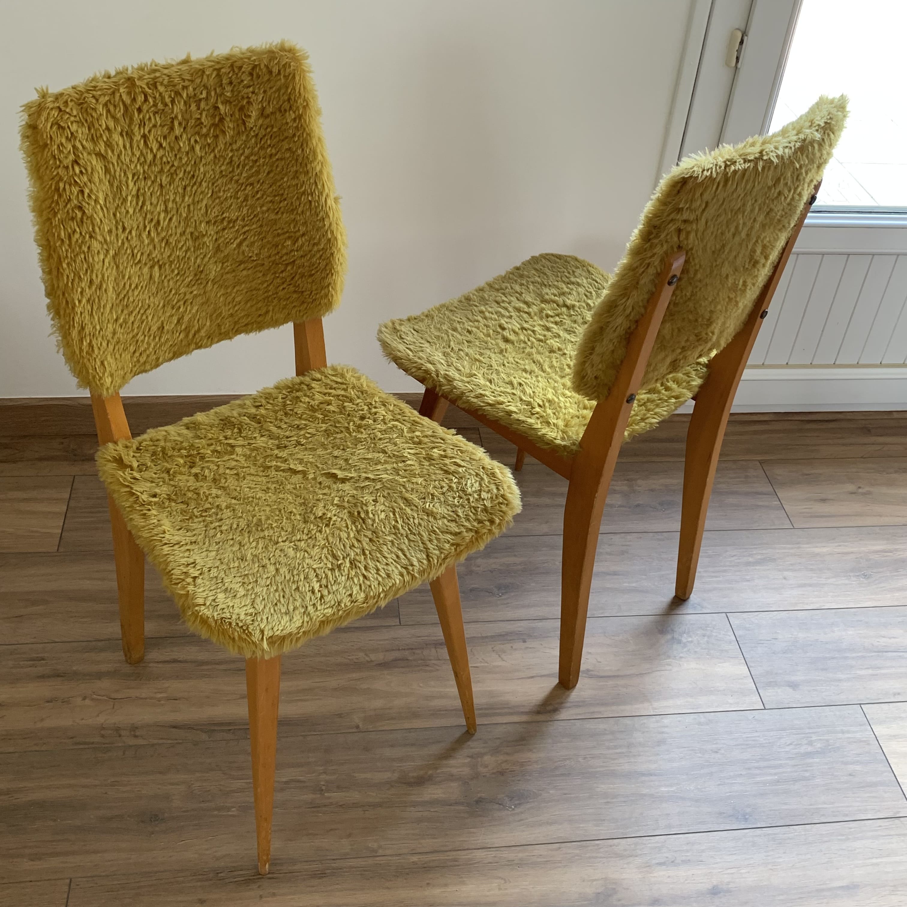 2 yellow moumoute chairs