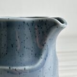 Blue and beige ceramic milk jug