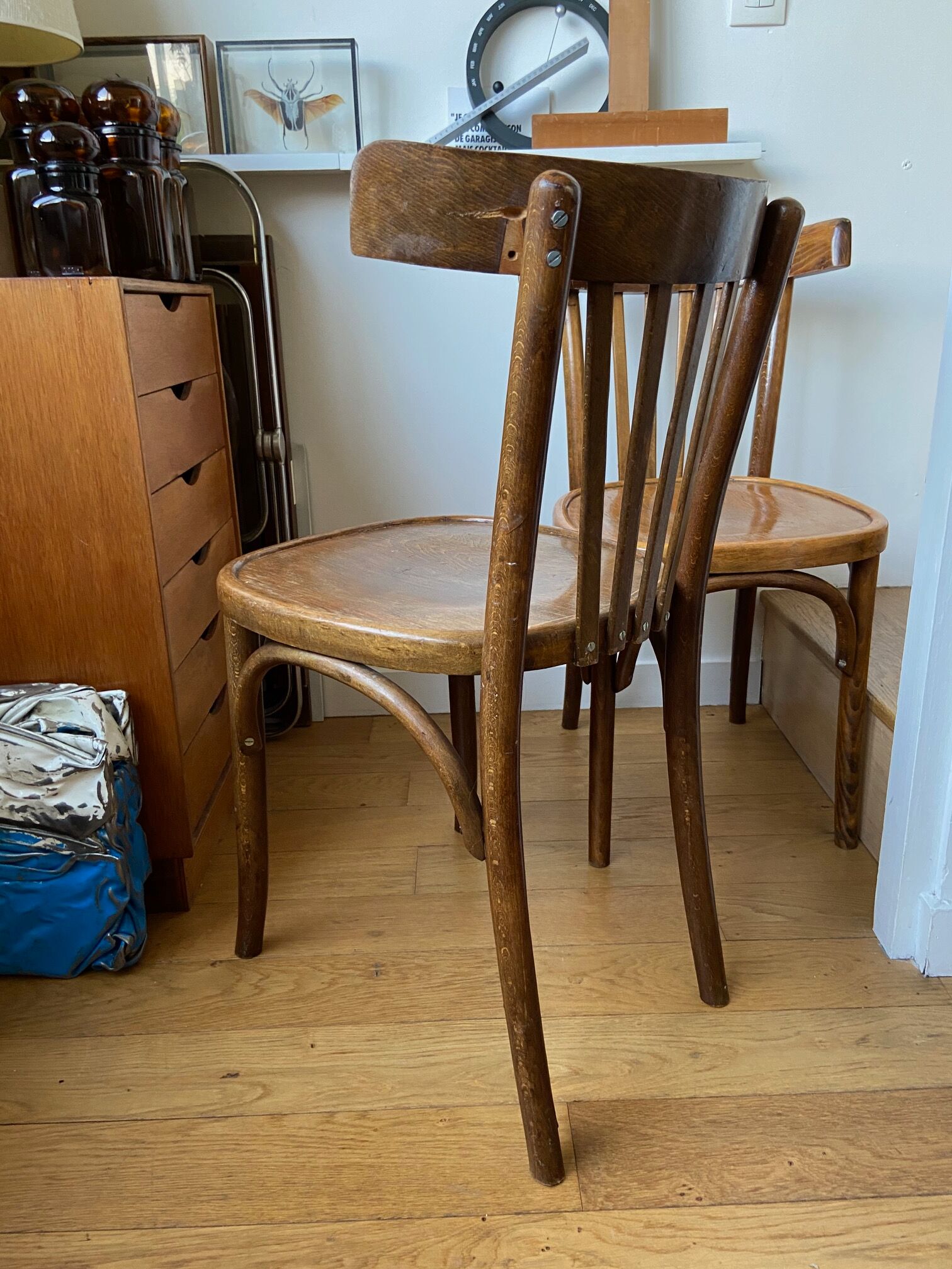 Pair of wooden bistro chairs
