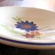 Set of 2 round serving dishes: Gien (Anthéor model) and Duralex.