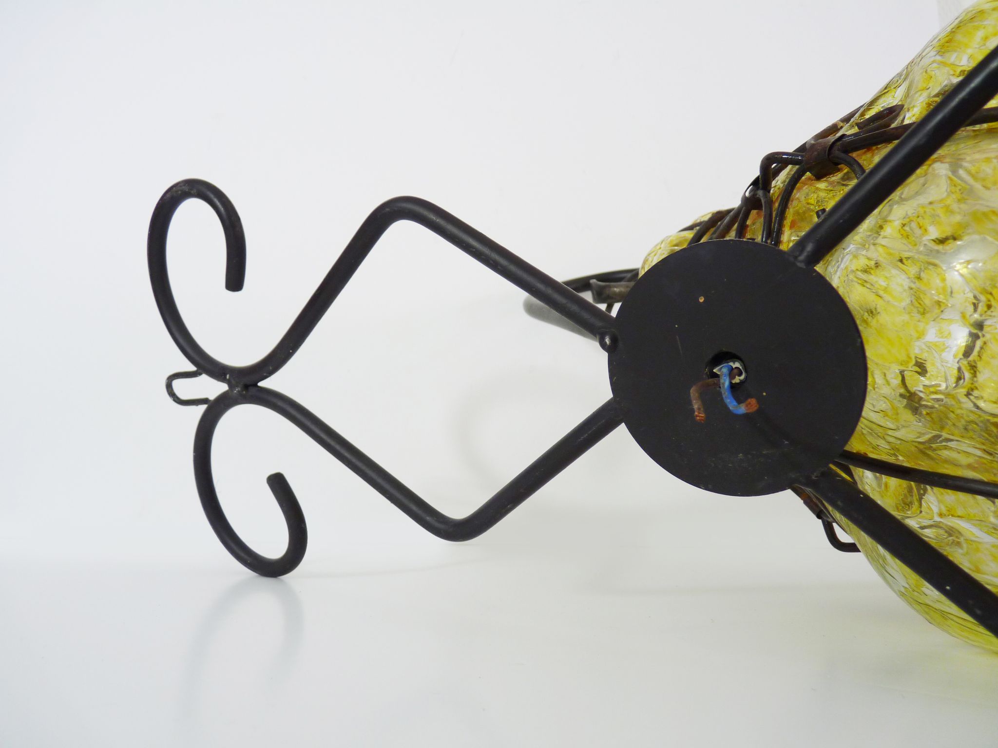Italian vintage wall lamp in yellow blown glass and wrought iron. Year 70 80