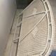 Vintage headboard in woven white rattan