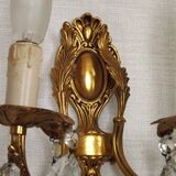 Pair of antique 2-light wall sconces in bronze with crystal pendants, Spain.
