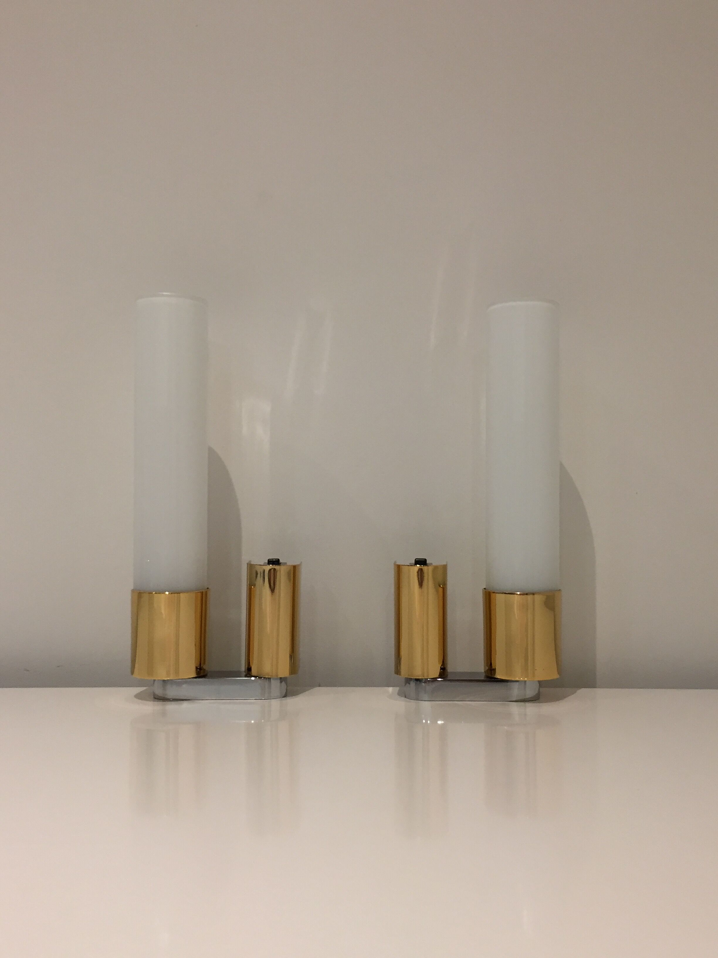 Pair of egoluce vintage orientable wall light in brass and Murano glass, Italy