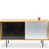 Low ash sideboard with sliding doors. 1960s.