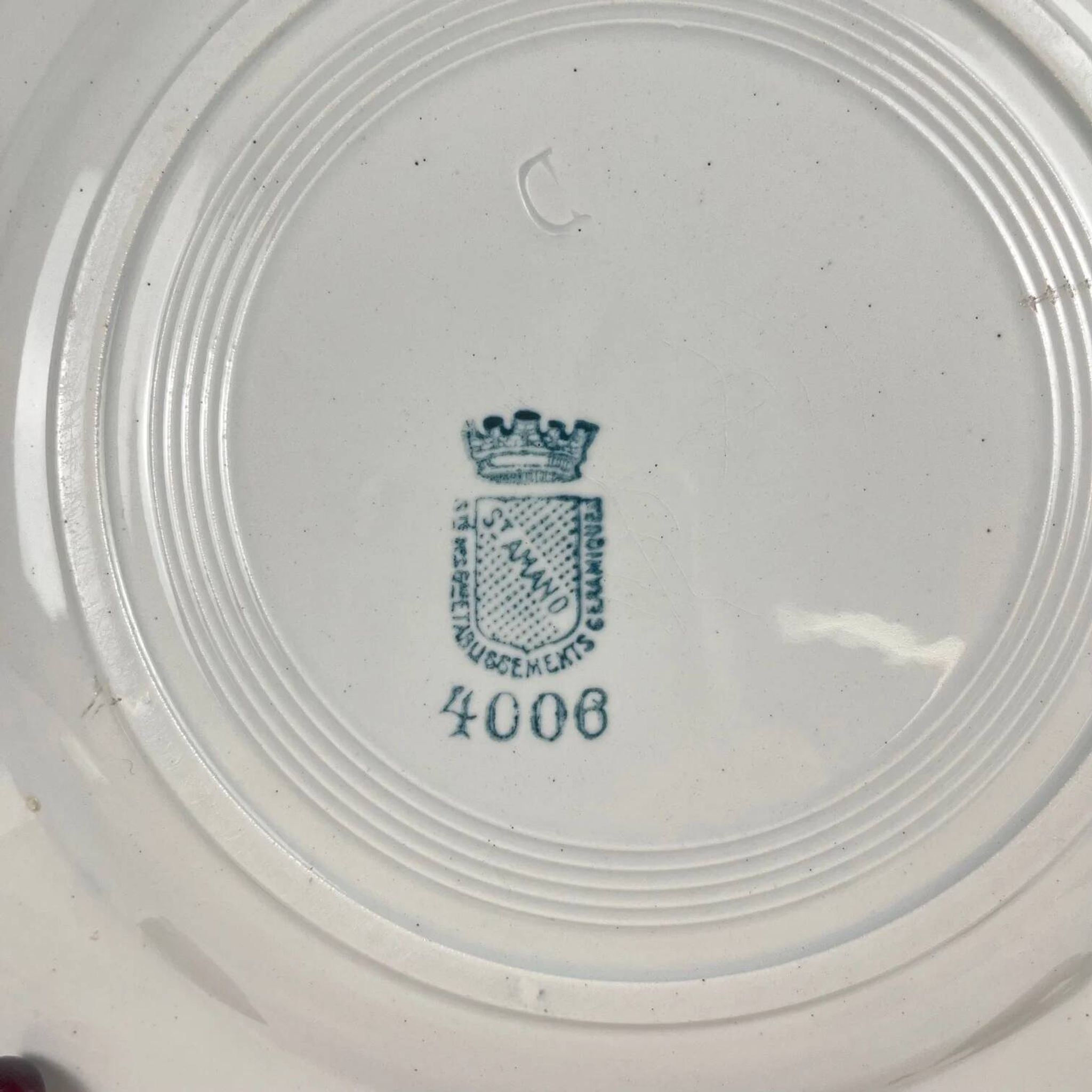 Set de 4 assiettes plates St Amand, vers 1930