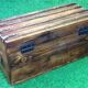 Antique travel chest Wood studded / wrapped in leather Brass lock with key (functional)