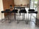 4 tabourets design BCN noirs