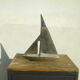 Sailboat brushed aluminum design