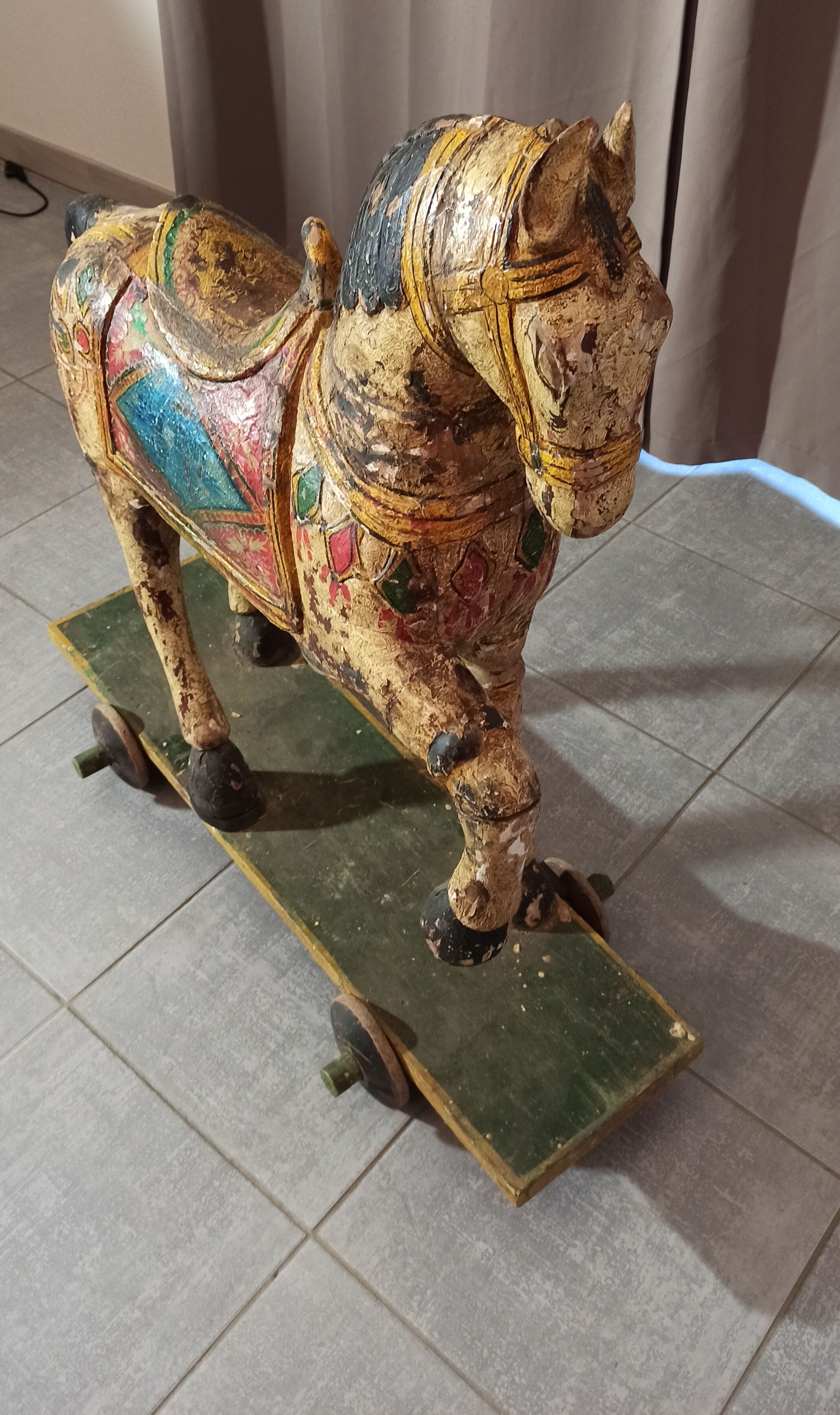 Old horse with wheels