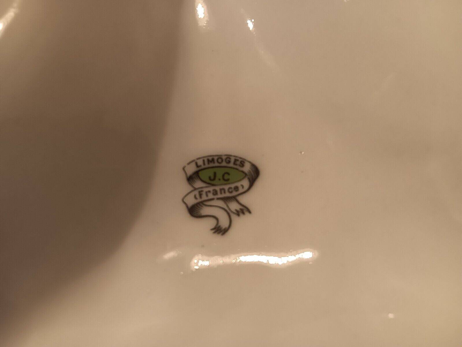 Beggar servant in Limoges JC porcelain floral decoration with roses