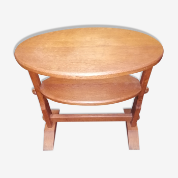 small old oval table made of wood