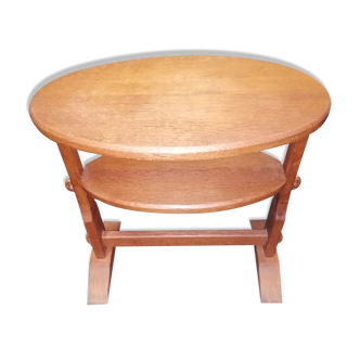 small old oval table made of wood