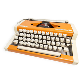 Olympia traveler luxury orange typewriter overhauled and new ribbon