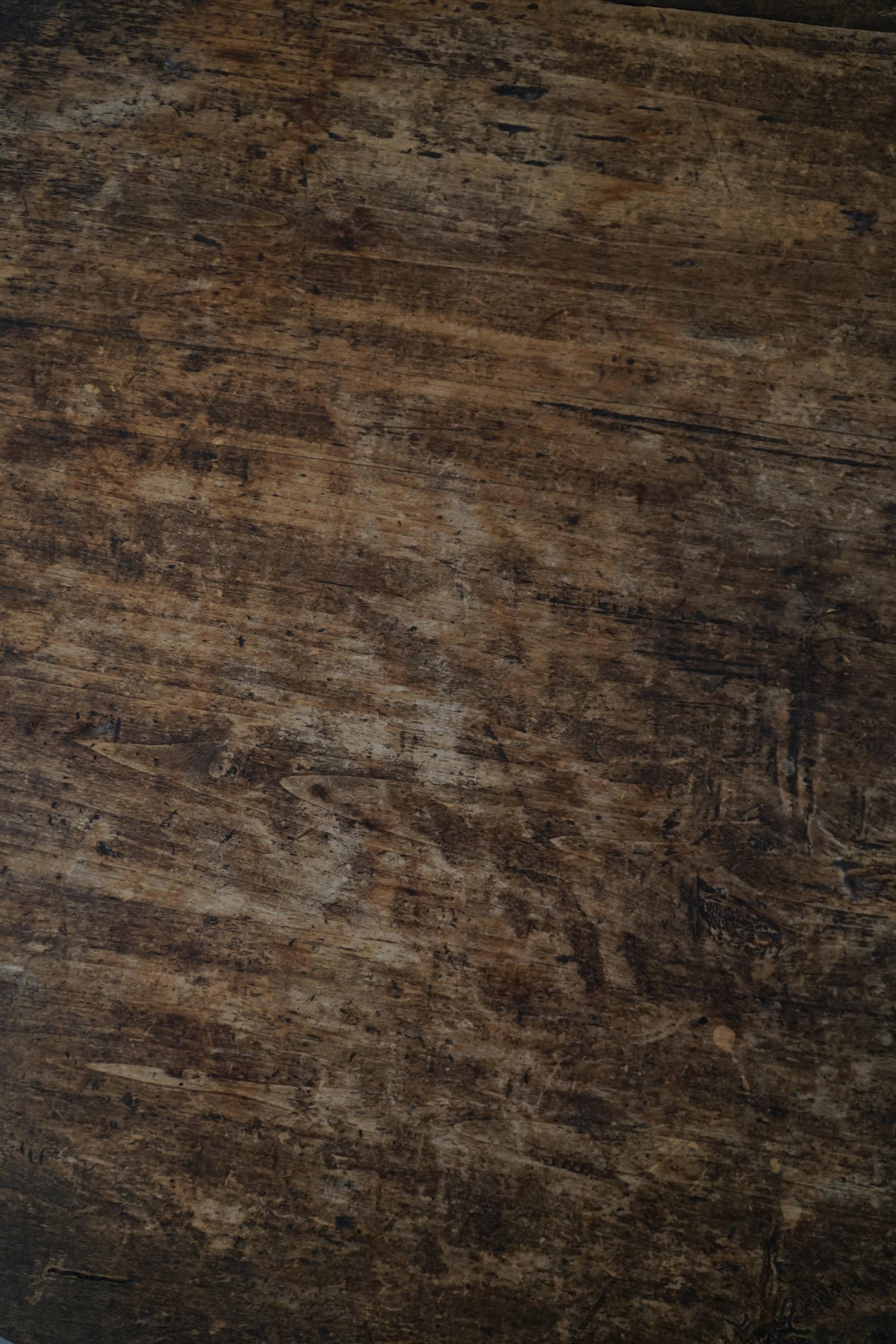 Round table with a tilting top from a 19th-century provincial French winemaker in oak.