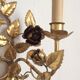 Leaves and flowers wall light in gold metal