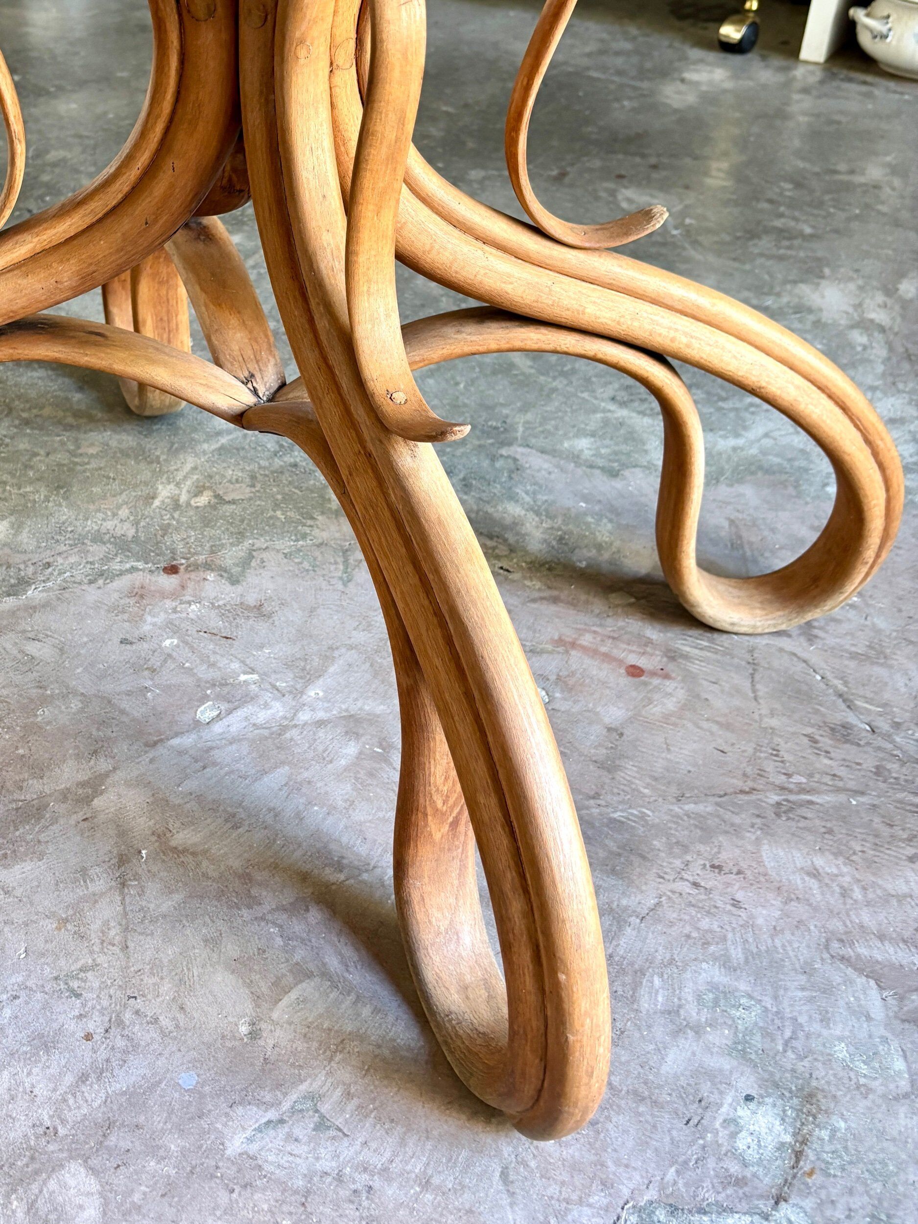 Thonet table no. 3 and 4 bent beech chairs with caning, circa 1890.