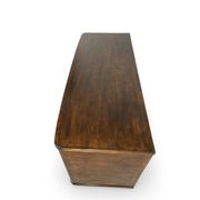 A vintage Italian chest of drawers, made of veneered walnut and solid wood,